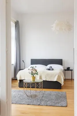 Ein Bett oder Betten in einem Zimmer der Unterkunft Cozy City Center Apartment