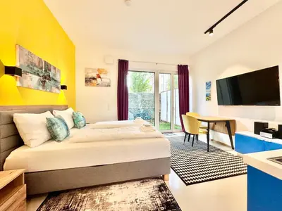 TV/Unterhaltungsangebot in der Unterkunft Möblierte Wohnung mit Terrasse