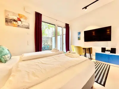 Ein Bett oder Betten in einem Zimmer der Unterkunft Möblierte Wohnung mit Terrasse
