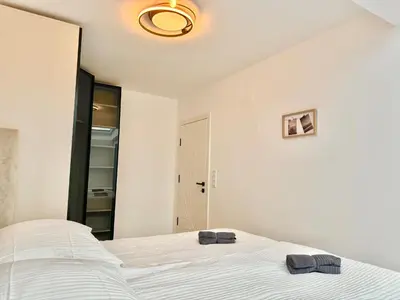 Ein Bett oder Betten in einem Zimmer der Unterkunft ASP Modern Apartments with Balcony & Free Parking