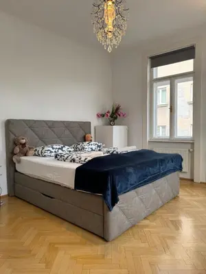 Ein Bett oder Betten in einem Zimmer der Unterkunft cozy apartment near Schönbrunn 17