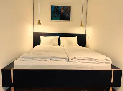 Ein Bett oder Betten in einem Zimmer der Unterkunft Flataid PremiumApart Museumsquartier