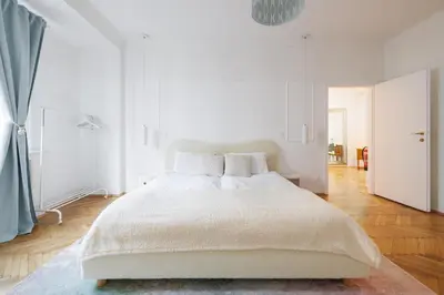 Ein Bett oder Betten in einem Zimmer der Unterkunft Papageno Apartments
