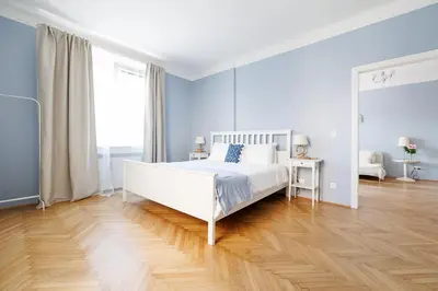 Ein Bett oder Betten in einem Zimmer der Unterkunft Papageno Apartments