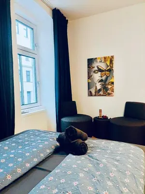 Ein Bett oder Betten in einem Zimmer der Unterkunft Comfy Private Rooms in 3BR Apartment Near Währinger Park