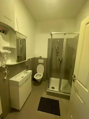 Ein Badezimmer in der Unterkunft Cozy Three-Room Apartment 14