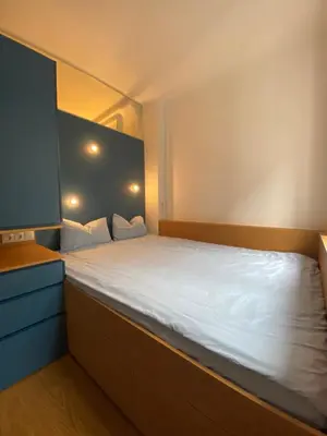 Ein Bett oder Betten in einem Zimmer der Unterkunft Designer Apartment Nähe Oper Naschmarkt
