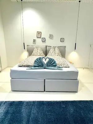 Ein Bett oder Betten in einem Zimmer der Unterkunft Opera apartment 149 m2