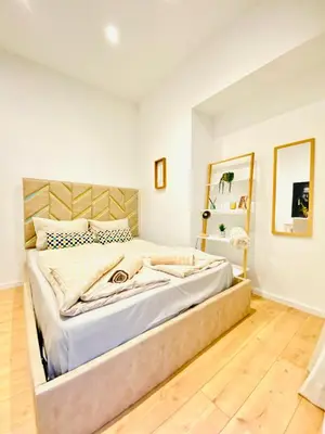 Ein Bett oder Betten in einem Zimmer der Unterkunft Lovely 4-BR Retreat Ottakring with Stunning City