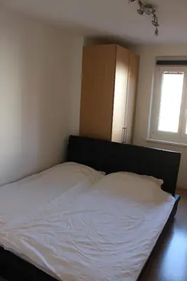 Ein Bett oder Betten in einem Zimmer der Unterkunft Happy Home