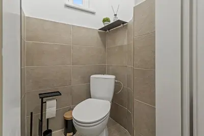 Ein Badezimmer in der Unterkunft Zentrale, stilvolle und gemütliche Wohnung