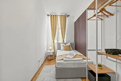 Ein Bett oder Betten in einem Zimmer der Unterkunft Zentrale, stilvolle und gemütliche Wohnung