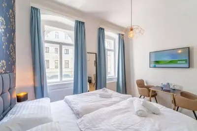 Ein Bett oder Betten in einem Zimmer der Unterkunft josef's home I Kolibri Studio I near UNO & VIC