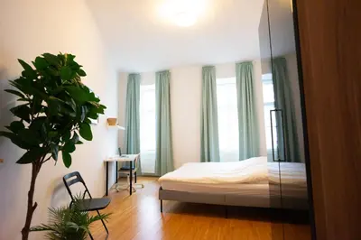 Ein Bett oder Betten in einem Zimmer der Unterkunft Modern 3 Bedroom Apartment in City Center