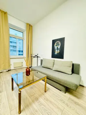 Ein Sitzbereich in der Unterkunft Cozy Private Rooms in 3BR Apartment Near FAC Platz