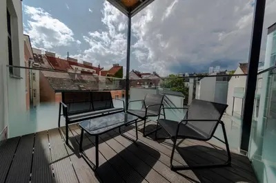 Ein Balkon oder eine Terrasse in der Unterkunft Short-Term Rental Vienna
