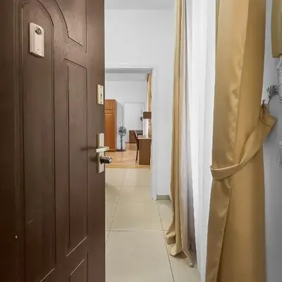 Two-Bedroom Balcony Retreat for 4 Near Millennium Tower
