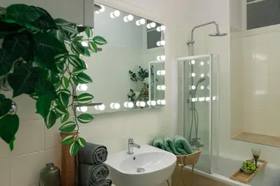 Ein Badezimmer in der Unterkunft LUXURYLOFT - direct access to shopping street, U3 station, close to center