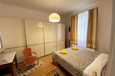 Ein Bett oder Betten in einem Zimmer der Unterkunft Deluxe Apartment mit Suite