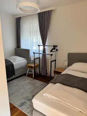 Ein Bett oder Betten in einem Zimmer der Unterkunft Chill & Relax Ferienhaus Breitenbrunn