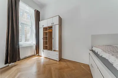 Ein Bett oder Betten in einem Zimmer der Unterkunft Happy Vienna
