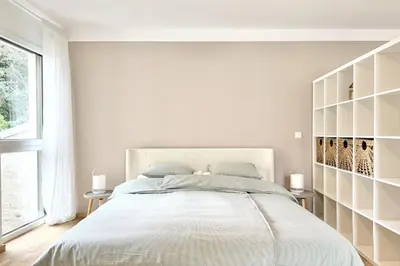 Ein Bett oder Betten in einem Zimmer der Unterkunft Rückzugsort bei Familienbesuch oder Arbeitsaufenthalt
