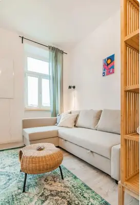 Ein Sitzbereich in der Unterkunft Cute Apartment