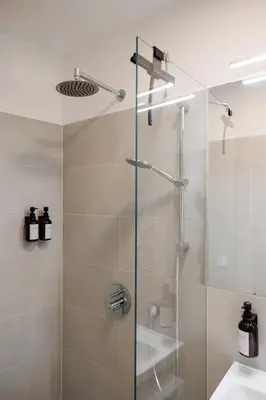 Ein Badezimmer in der Unterkunft BOHO Loft - Augarten City Apartment, Terrace