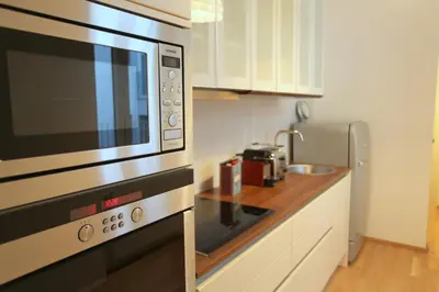 Küche/Küchenzeile in der Unterkunft Moderne Stadtwohnung mit Balkon