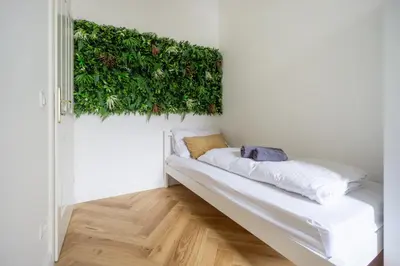 Ein Bett oder Betten in einem Zimmer der Unterkunft Central elegant Heritage Apartment with modern comfort