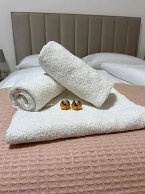 Ein Bett oder Betten in einem Zimmer der Unterkunft Neu! City Apartment im Stadtzentrum 4
