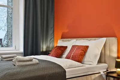 Ein Bett oder Betten in einem Zimmer der Unterkunft Grand Urban Residence Apartment