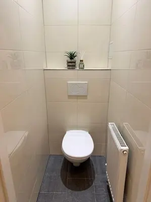 Ein Badezimmer in der Unterkunft Neu! City Apartment im Stadtzentrum 22