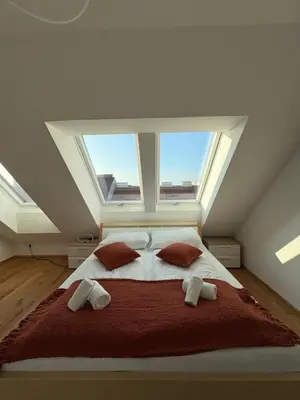 Ein Bett oder Betten in einem Zimmer der Unterkunft FeelHome-Terrasse-4 Gäste-WiFi