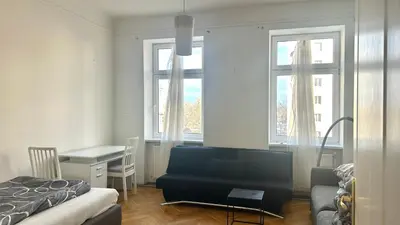 Ein Bett oder Betten in einem Zimmer der Unterkunft City Center Apartment