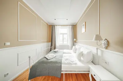 Ein Bett oder Betten in einem Zimmer der Unterkunft Nobile Schönbrunn Residences