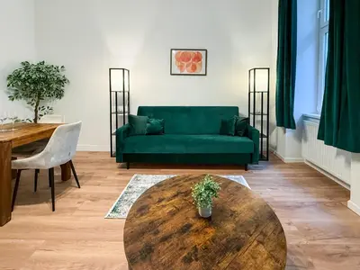 Ein Sitzbereich in der Unterkunft Enjoy Apartments, AC, Quiet Street, Couple Getaway