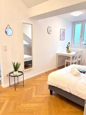 Ein Bett oder Betten in einem Zimmer der Unterkunft Simply Sec Apartment