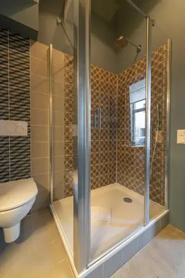 Ein Badezimmer in der Unterkunft AWerner Suites Belvedere - Der Schmied