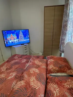 Ein Bett oder Betten in einem Zimmer der Unterkunft Smart Home Vienna