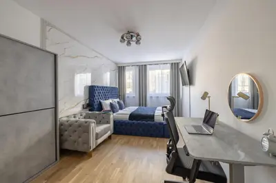 Ein Bett oder Betten in einem Zimmer der Unterkunft EA- Design Apartment nähe Hauptplatz