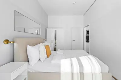 Ein Bett oder Betten in einem Zimmer der Unterkunft 4 Min to Metro I 12 Min to Inner City I Top Wifi