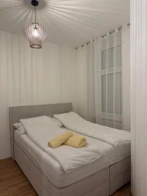 Ein Bett oder Betten in einem Zimmer der Unterkunft Wohnung in 1030 Wien