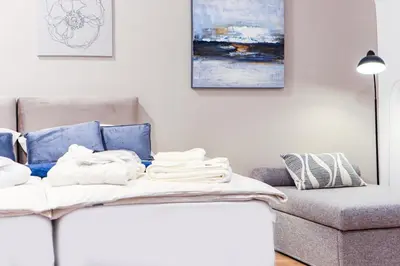 Ein Bett oder Betten in einem Zimmer der Unterkunft Apartment Deluxe - right near Vienna's Old City