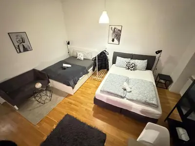 Ein Bett oder Betten in einem Zimmer der Unterkunft Stylish Apartment in Vienna