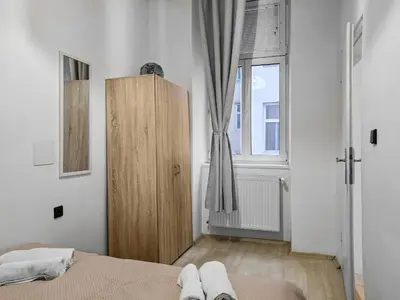 Ein Bett oder Betten in einem Zimmer der Unterkunft 4Rooms center