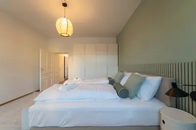 Ein Bett oder Betten in einem Zimmer der Unterkunft josef's home I Urban Living I Premium Apartment 06