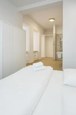 Ein Bett oder Betten in einem Zimmer der Unterkunft City Center Apartments