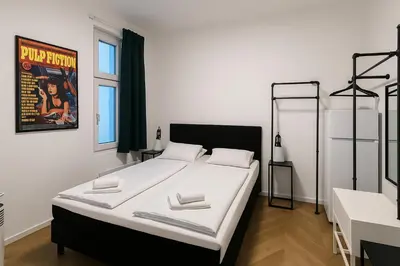 Ein Bett oder Betten in einem Zimmer der Unterkunft City Center Apartments