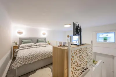 Ein Bett oder Betten in einem Zimmer der Unterkunft Olive Oasis